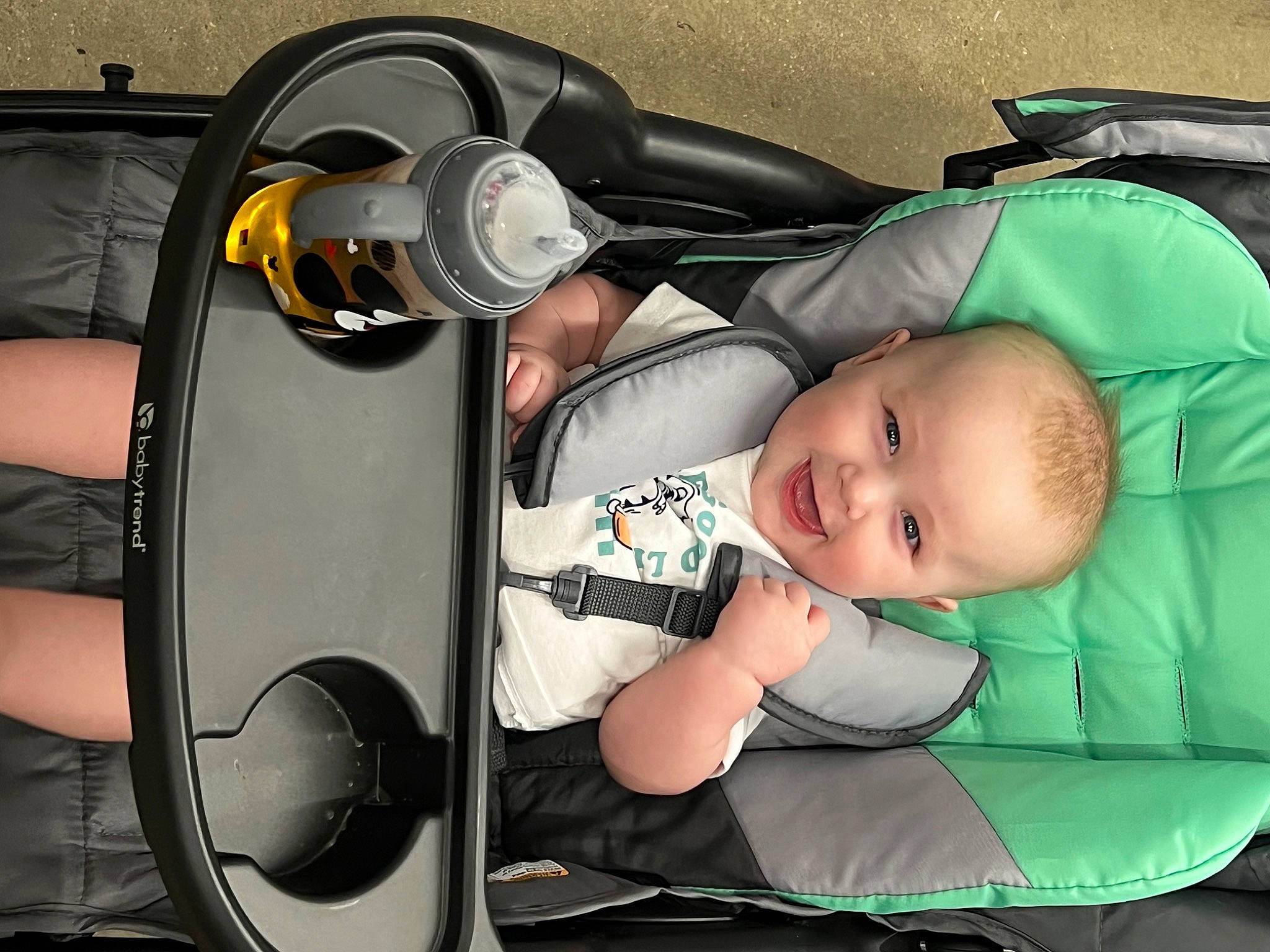 Liam is registered to the contest to win money with this photo: audio_equipment, auto_part, automotive_design, automotive_lighting, automotive_tire, automotive_wheel_system, baby, baby_carriage, baby_products, baby_toddler_clothing, car_seat, child, comfort, flash_photography, hubcap, joy, motor_vehicle, person, rim, smile