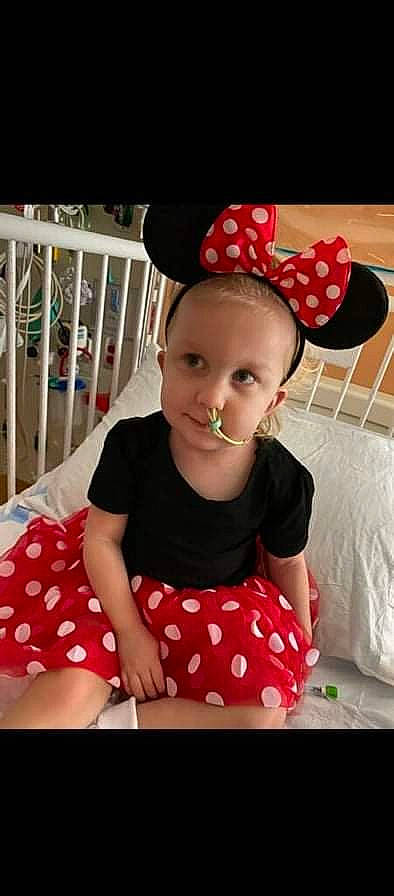 Adriana joined the competition — help win amazing prizes! baby_toddler_clothing, cap, child, costume_hat, dress, fedora, fence, fun, happy, hat, pattern, person, pink, plaid, product, red, sleeve, sun_hat, t_shirt, toddler