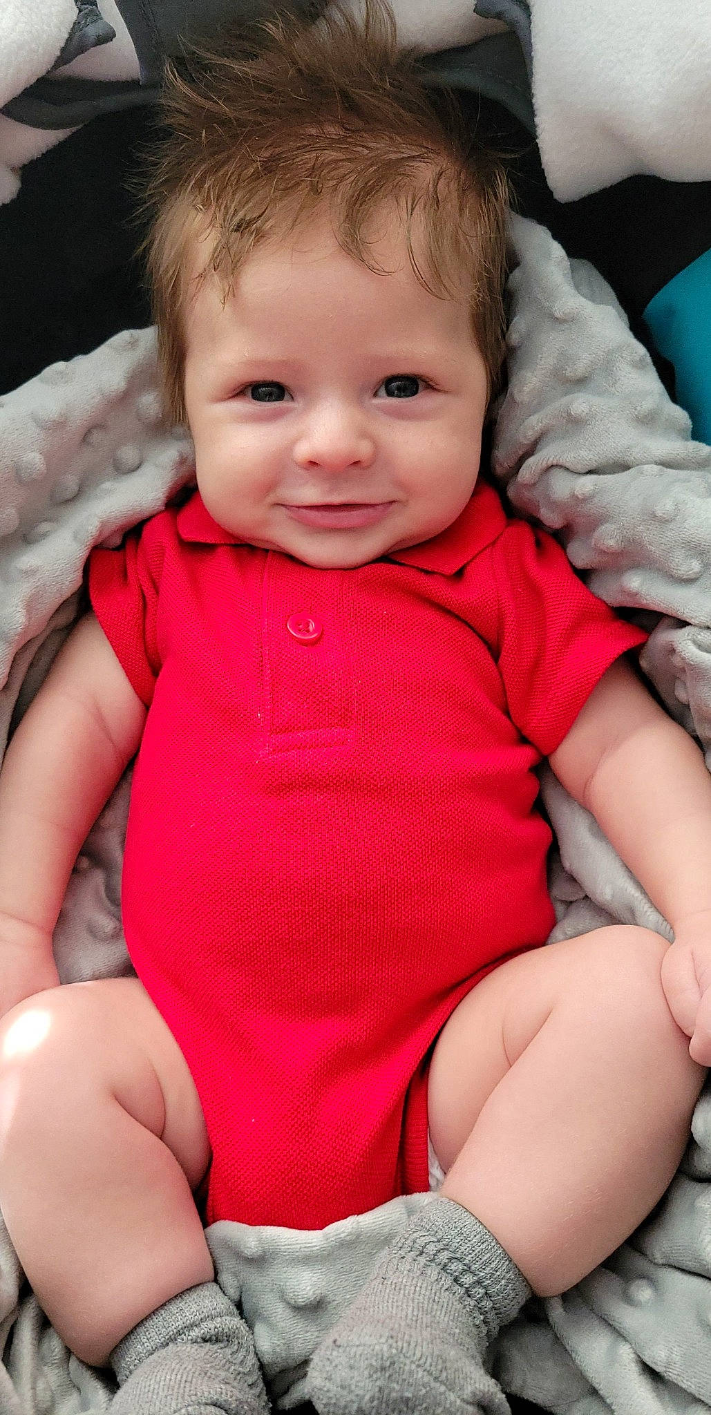 Dexter is registered to the contest to win money with this photo: arm, baby_toddler_clothing, cheek, chin, eye, eyebrow, face, facial_expression, hand, joint, joy, leg, lip, mouth, muscle, nose, organ, person, photograph, product