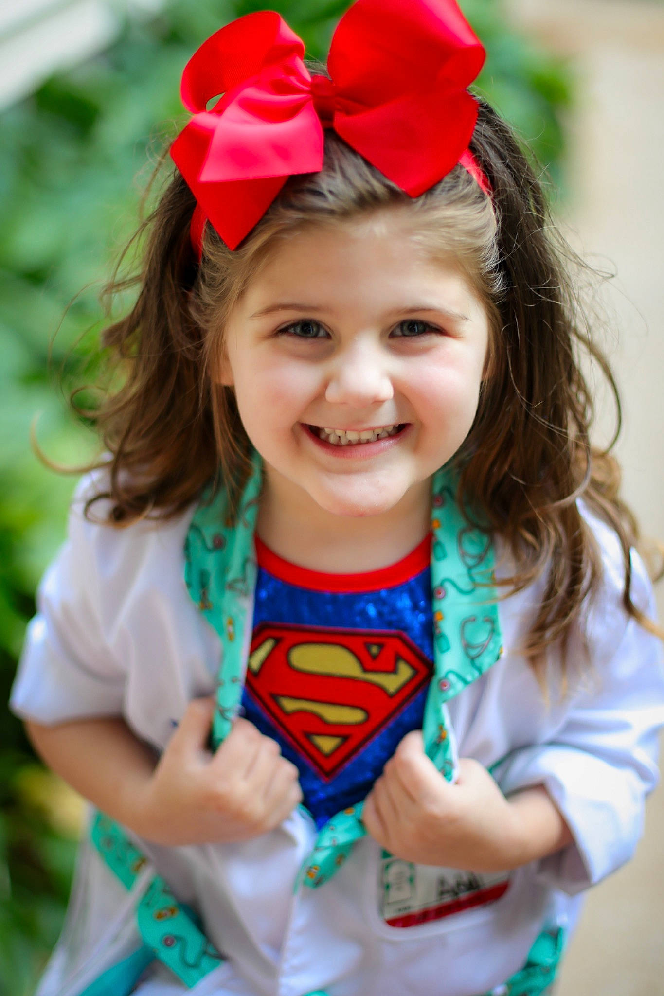 Addi is registered to the contest to win money with this photo: beauty, child, clothing, dress, eye, face, fun, happy, hat, head, headgear, headpiece, headwear, joy, nature, neck, person, petal, pink, plant