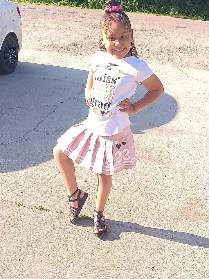 Sha'Niyah joined the competition — help win amazing prizes! asphalt, day_dress, dress, electric_blue, eyewear, fun, happy, hat, human_leg, joy, knee, pattern, person, pink, shoe, sleeve, smile, thigh, tire, vehicle_door