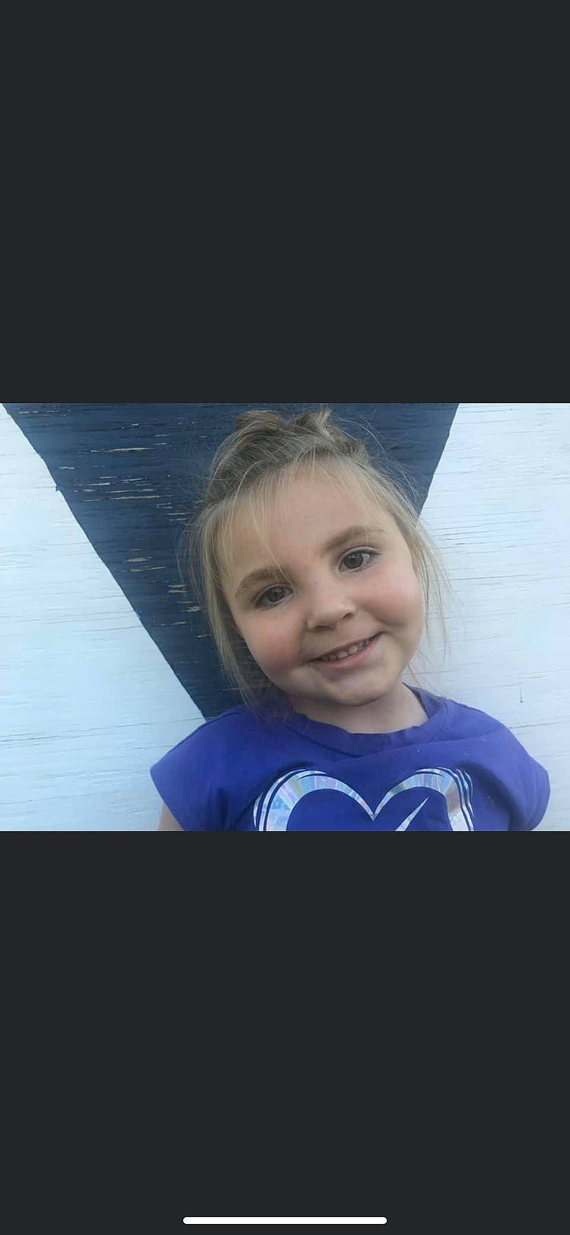 Gabby is registered to the contest to win money with this photo: blond, brown_hair, electric_blue, eyebrow, eyelash, flash_photography, fun, happy, iris, joy, lip, long_hair, person, reflection, sitting, sky, smile, t_shirt, tints_and_shades, toddler