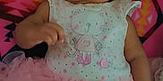 Emma joined the competition — help win amazing prizes! baby, infant, tutu, pink, onesie, cat_print, blanket, patterned_blanket, sleepy, cute, chubby_cheeks, clothing, lying_down, child, indoor, soft_fabric, adorable, person, portrait, resting