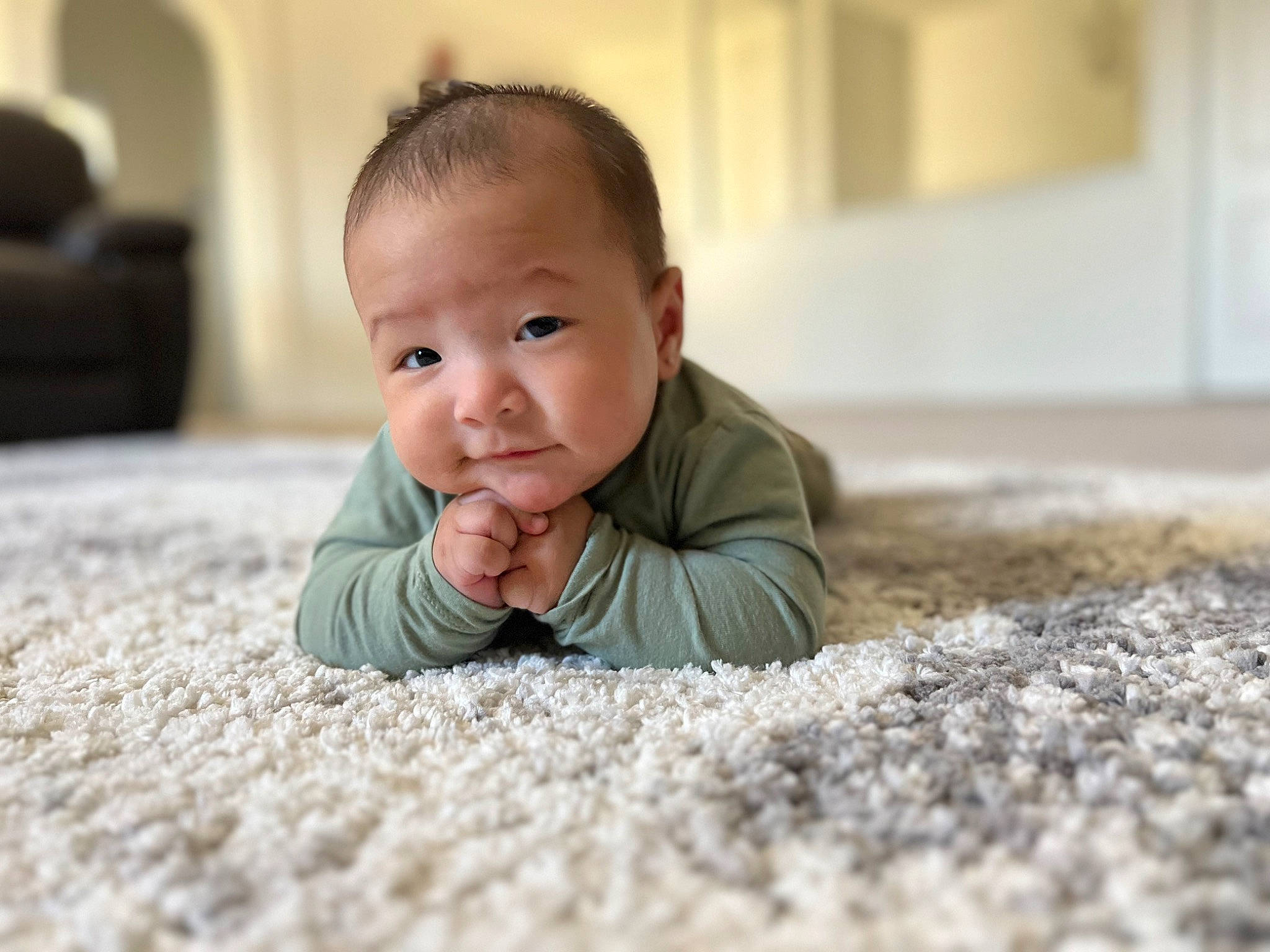 Sayan joined the competition — help win amazing prizes! baby, baby_toddler_clothing, carpet, cheek, child, comfort, crawling, flash_photography, floor, flooring, grass, grey, happy, hardwood, person, room, sitting, skin, smile, toddler