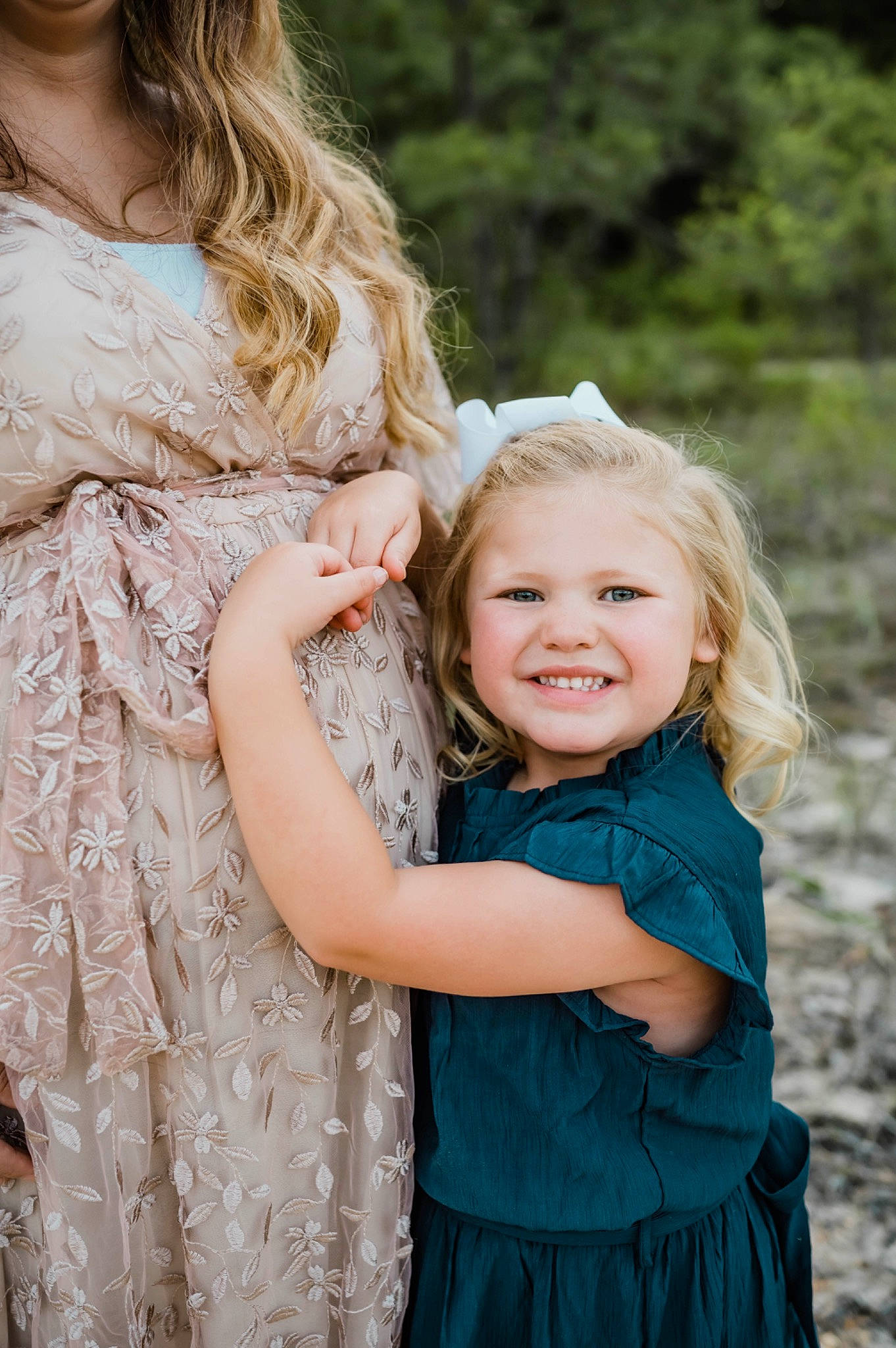 Adalynn is registered to the contest to win money with this photo: bridal_party_dress, dress, flash_photography, formal_wear, gesture, grass, hair, happy, interaction, joy, one_piece_garment, outerwear, people_in_nature, person, pink, plant, shoulder, skin, smile, standing
