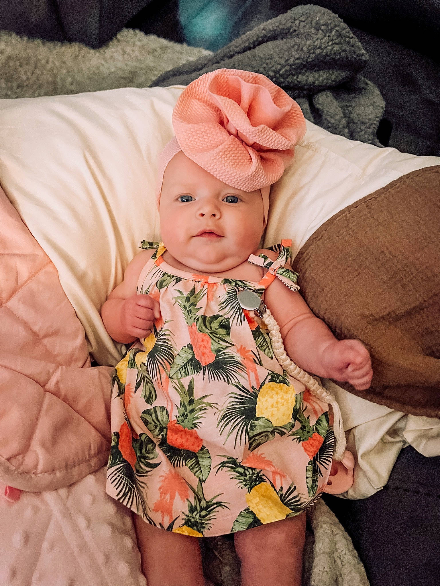 Blakelee joined the competition — help win amazing prizes! baby, baby_sleeping, baby_toddler_clothing, cap, cheek, child, comfort, day_dress, face, finger, head, headwear, nail, pattern, person, pink, sitting, skin, sleeve, textile