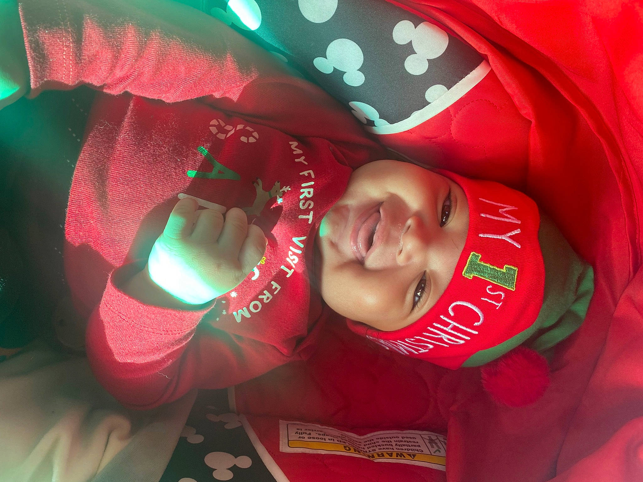 Asiah joined the competition — help win amazing prizes! baby, cap, carmine, child, christmas_eve, christmas_ornament, event, fictional_character, fun, happy, hat, headwear, holiday, magenta, pattern, person, plant, sleeve, smile, t_shirt
