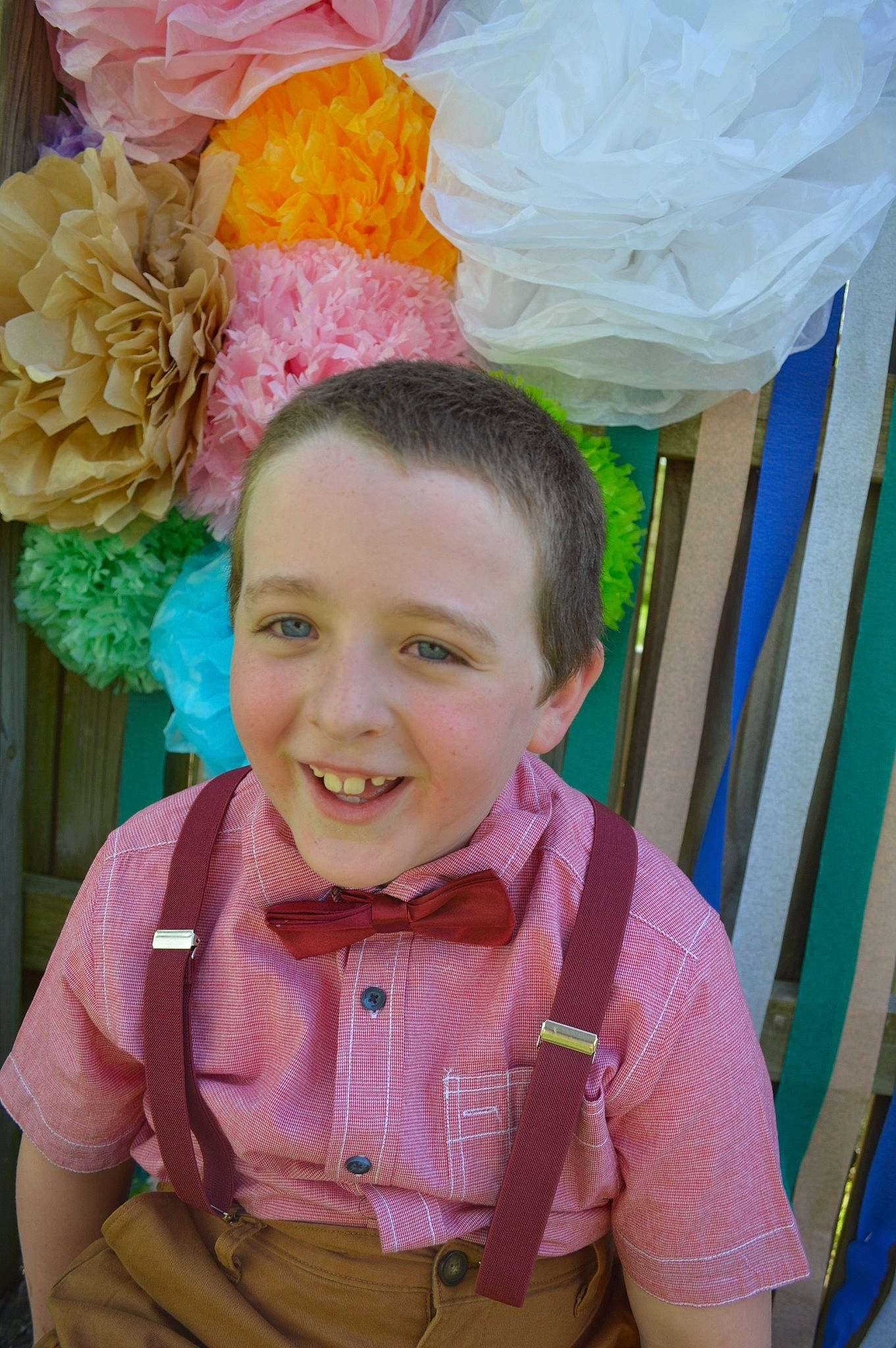 Bryce joined the competition — help win amazing prizes! baby, child, fashion_accessory, flower, hair_accessory, head, headgear, joy, party, person, pink, plant, smile, toddler, yellow