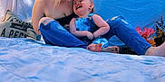 Riley joined the competition — help win amazing prizes! blanket, blue_background, bonding, casual_clothing, child, denim, family, flowers, happy, joy, laughing, natural_light, outdoor, overalls, pillow, portrait, relaxed, smiling, toddler, woman