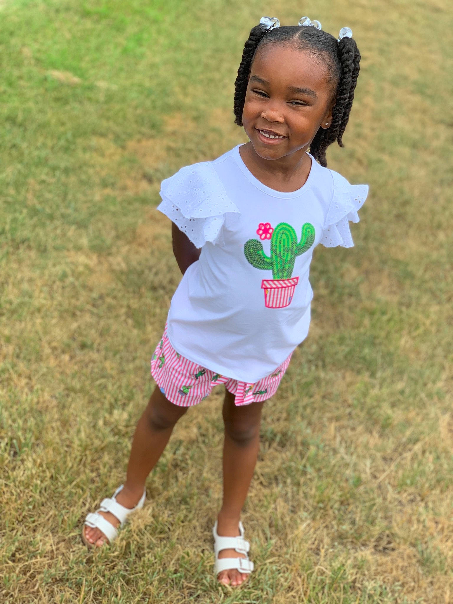 Ayva is registered to the contest to win money with this photo: child, face, fun, grass, green, hairstyle, happy, head, joy, people, person, pink, plant, play, recreation, skin, smile, summer, t_shirt, toddler