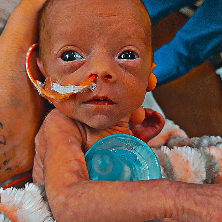 Danni joined the competition — help win amazing prizes! architecture, baby, blanket, bodypart, building, clothing, couch, face, finger, furniture, glove, hand, head, homedecor, hospital, newborn, person, photography, portrait, toy