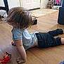 Mica is registered to the contest to win money with this photo: black, comfort, finger, floor, flooring, hardwood, human_leg, jeans, joint, knee, laminate_flooring, leg, shoe, shoulder, sneakers, standing, thigh, toddler, varnish, wood