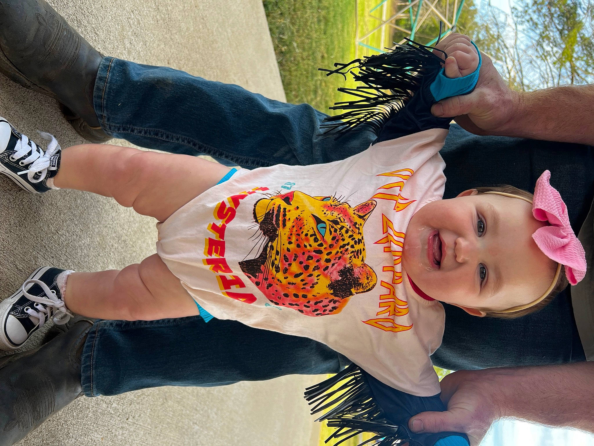 Everleigh is registered to the contest to win money with this photo: baby_toddler_clothing, child, cool, finger, fun, grass, hand, happy, human_leg, knee, leg, leisure, person, shoe, sleeve, sneakers, summer, thigh, toddler, walking_shoe