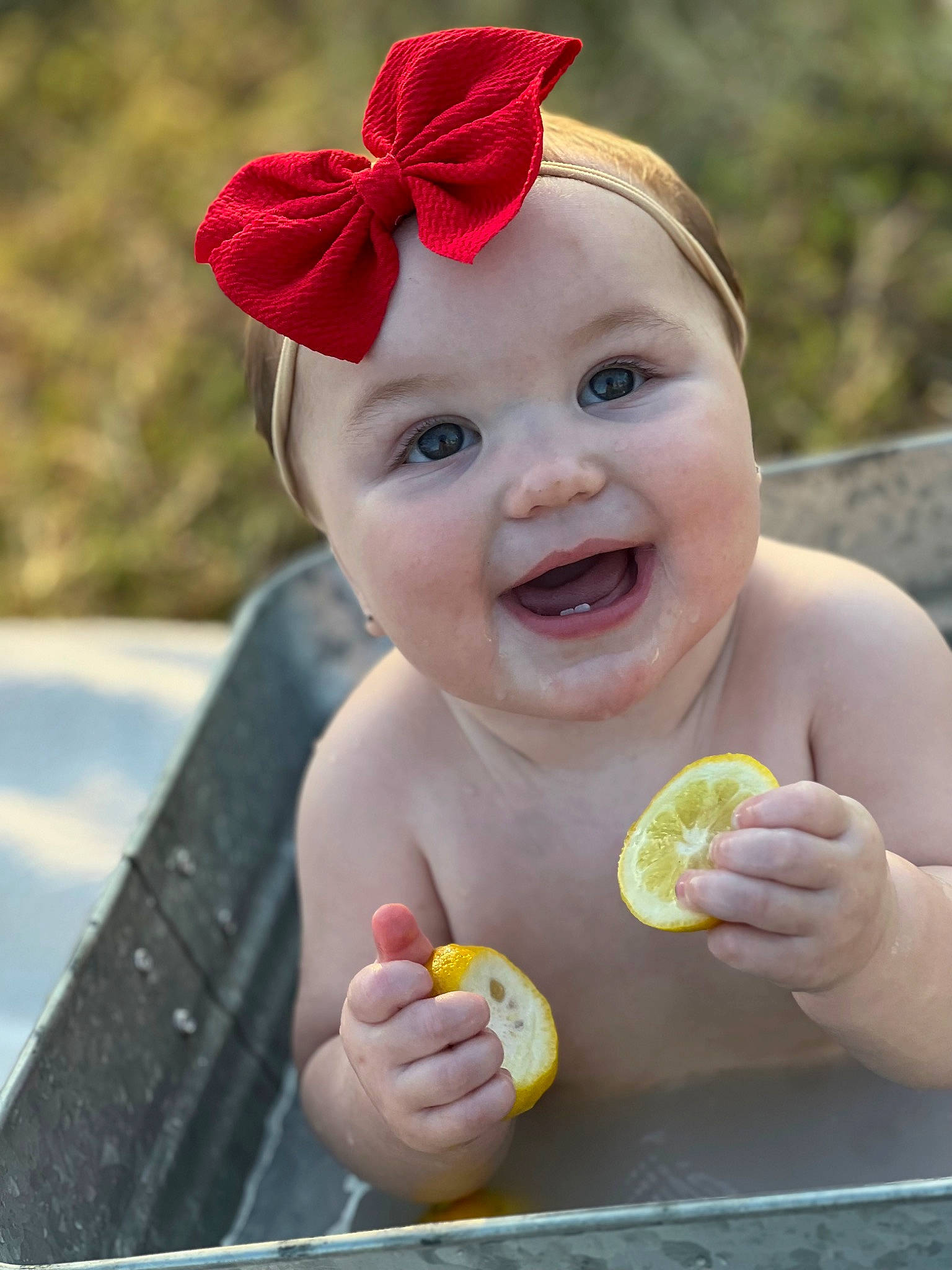 Everleigh joined the competition — help win amazing prizes! baby, baby_toddler_clothing, child, costume_hat, finger, food, fruit, fun, gesture, grass, hand, happy, hat, headband, headwear, joy, nail, person, plant, skin