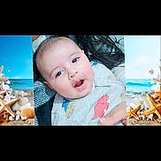 Sahib joined the competition — help win amazing prizes! baby, background, beach_theme, child, close_up, clothing, curious, cute, dinosaur_print, expression, face, hair, hand, human, indoor, infant, open_mouth, person, portrait, seashells