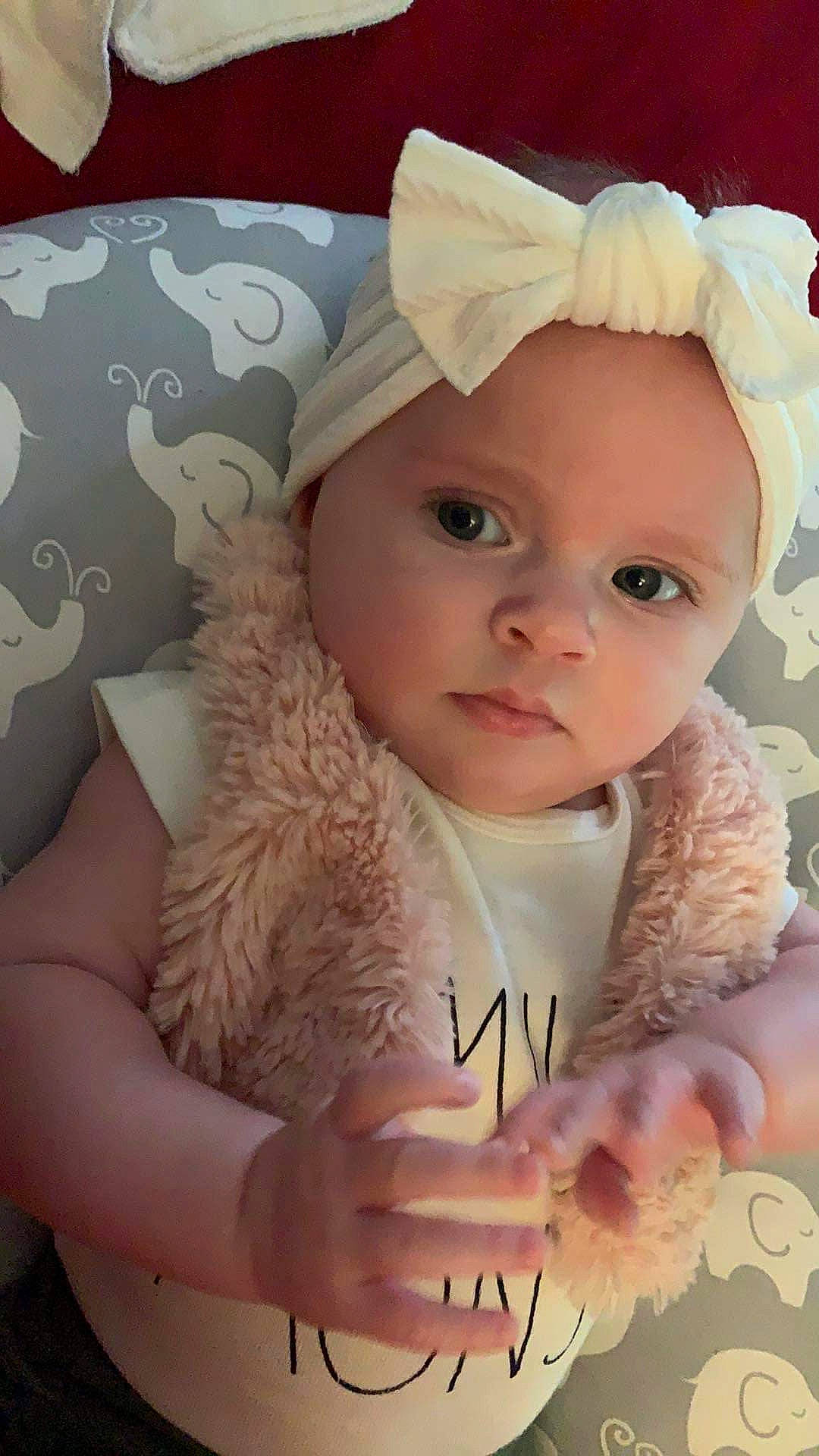 Helena joined the competition — help win amazing prizes! baby, baby_products, baby_toddler_clothing, cap, cheek, child, costume_hat, eye, gesture, happy, headband, headgear, headpiece, headwear, iris, lip, person, pink, skin, sleeve