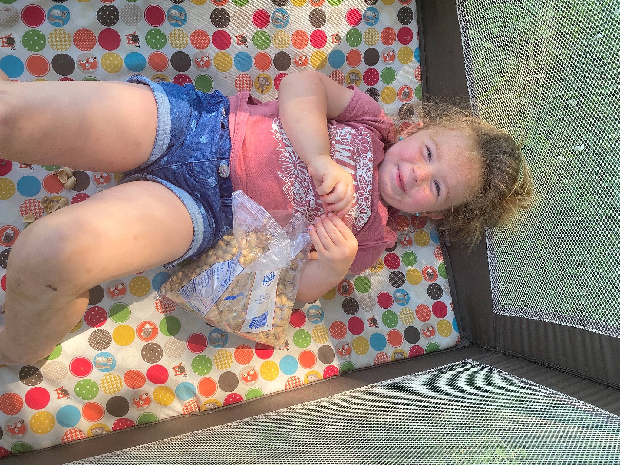 Savanna joined the competition — help win amazing prizes! abdomen, baby, baby_toddler_clothing, child, comfort, flooring, fun, green, happy, human_leg, joy, leisure, linens, pattern, person, pink, room, sitting, smile, textile