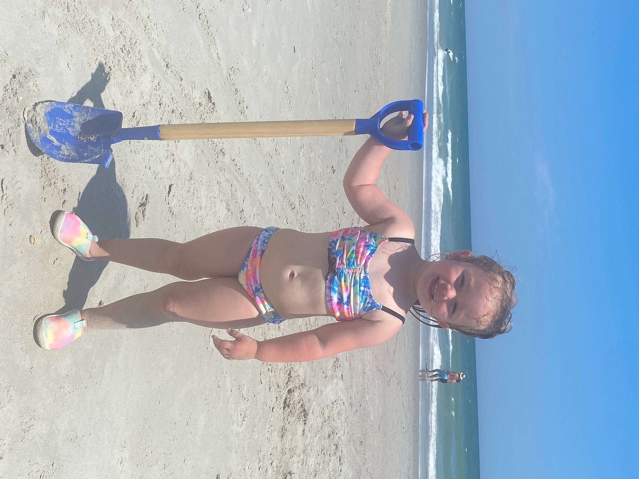 Savanna is registered to the contest to win money with this photo: abdomen, arm, beach, blue, calf, chest, elbow, electric_blue, fun, hat, human_leg, joy, knee, leg, leisure, person, recreation, sky, thigh, trunk