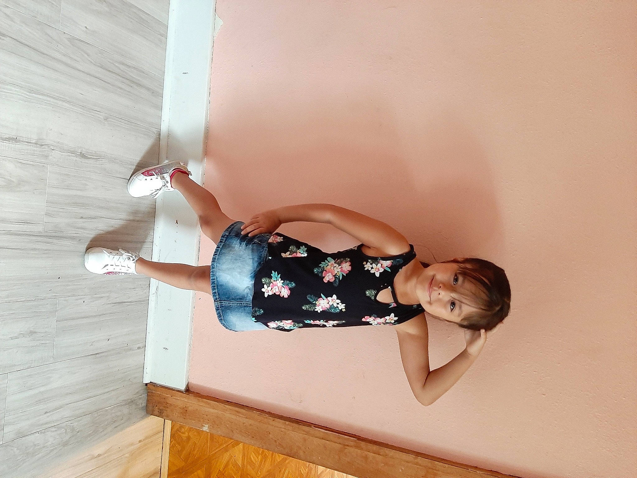 Adriana is registered to the contest to win money with this photo: ceiling, comfort, elbow, floor, flooring, fun, hardwood, human_leg, joy, knee, pattern, person, room, sitting, sleeve, stairs, thigh, waist, wood, wood_flooring