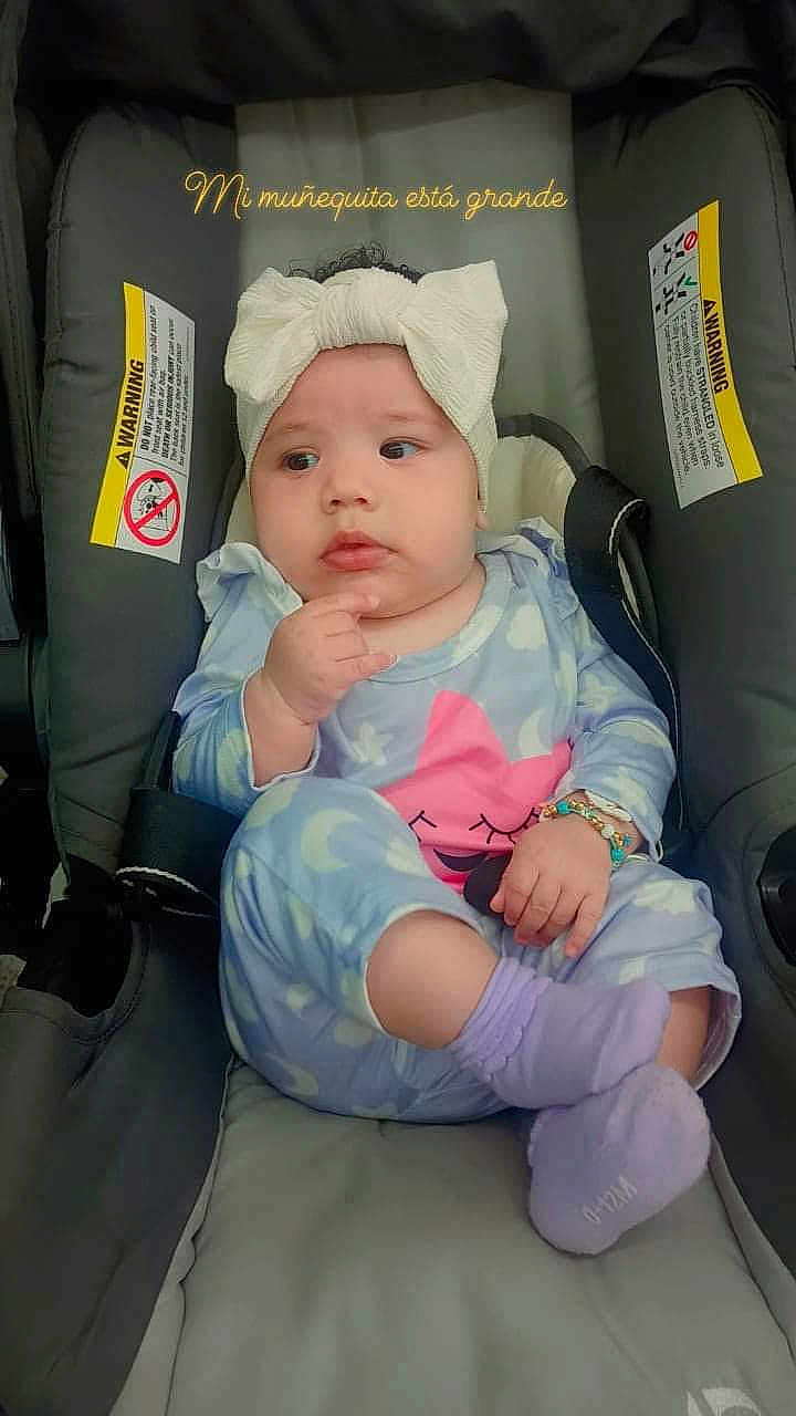 Leah Flores joined the competition — help win amazing prizes! baby, baseballcap, bonnet, cap, clothing, cushion, face, furniture, glove, hat, head, homedecor, newborn, pants, person, photography, portrait, sitting, sleeping, t_shirt