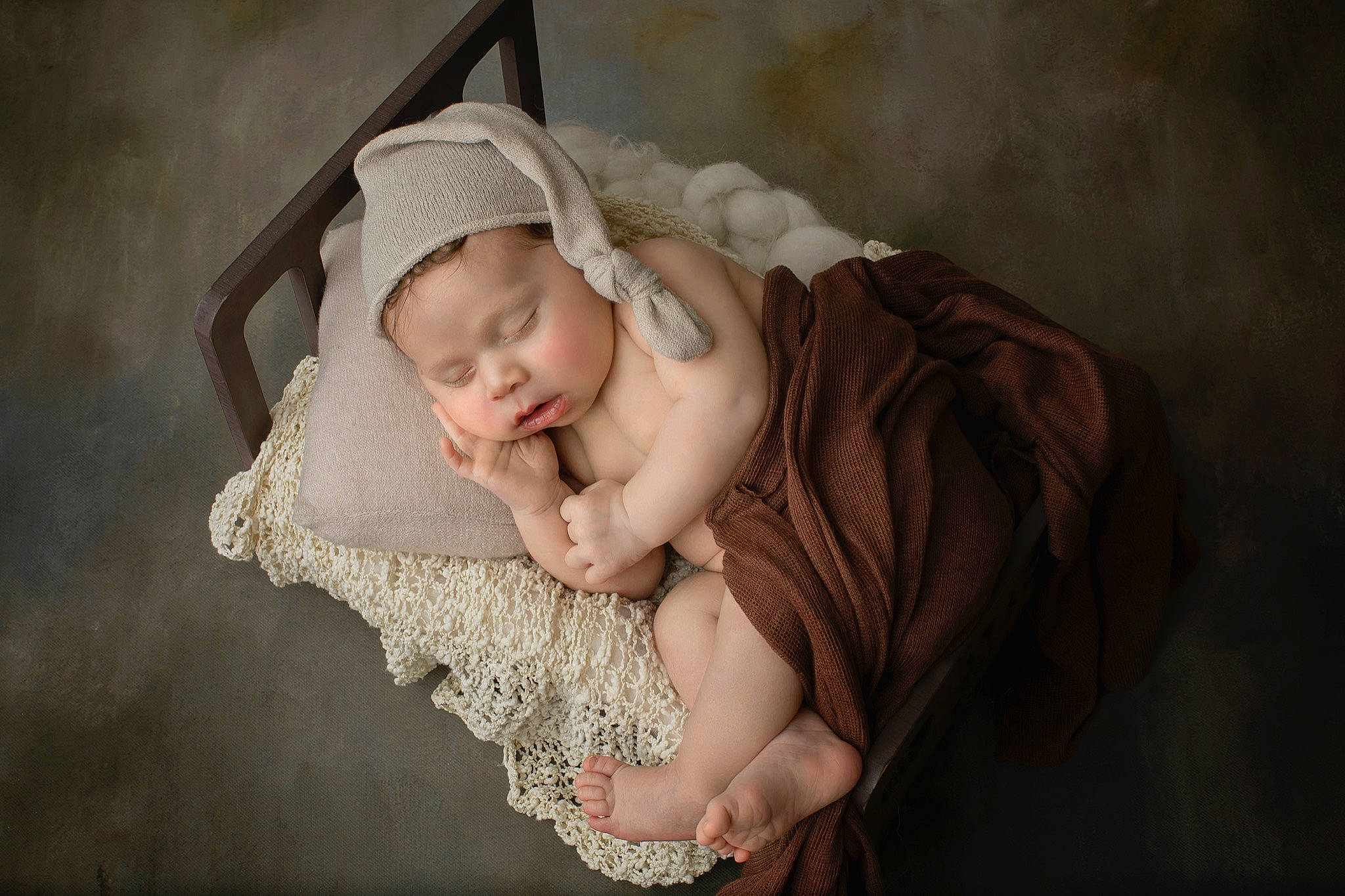 Jovanni is registered to the contest to win money with this photo: baby, baby_products, baby_toddler_clothing, beanie, child, comfort, crochet, embellishment, fashion_accessory, flash_photography, hair_accessory, headpiece, headwear, jewellery, linens, person, portrait_photography, sitting, skin, sleeve