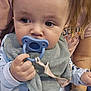 Cole joined the competition — help win amazing prizes! adult, baby, bib, child, closeup, clothing, comfort, curious, expression, face, hand, holding, indoor, pacifier, pajamas, person, skin, tattoo, watch, young_child