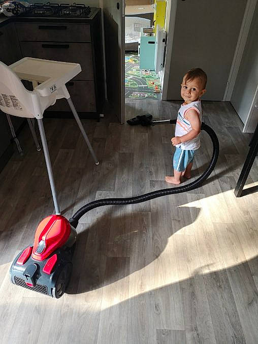 Matthew participe au concours pour gagner de l'argent avec cette photo : baby, baby_toddler_clothing, child, cleaner, cleanliness, concrete_grinder, floor, flooring, hardwood, household_cleaning_supply, household_supply, laminate_flooring, machine, outdoor_power_equipment, person, play, plywood, refrigerator, toddler, vacuum_cleaner