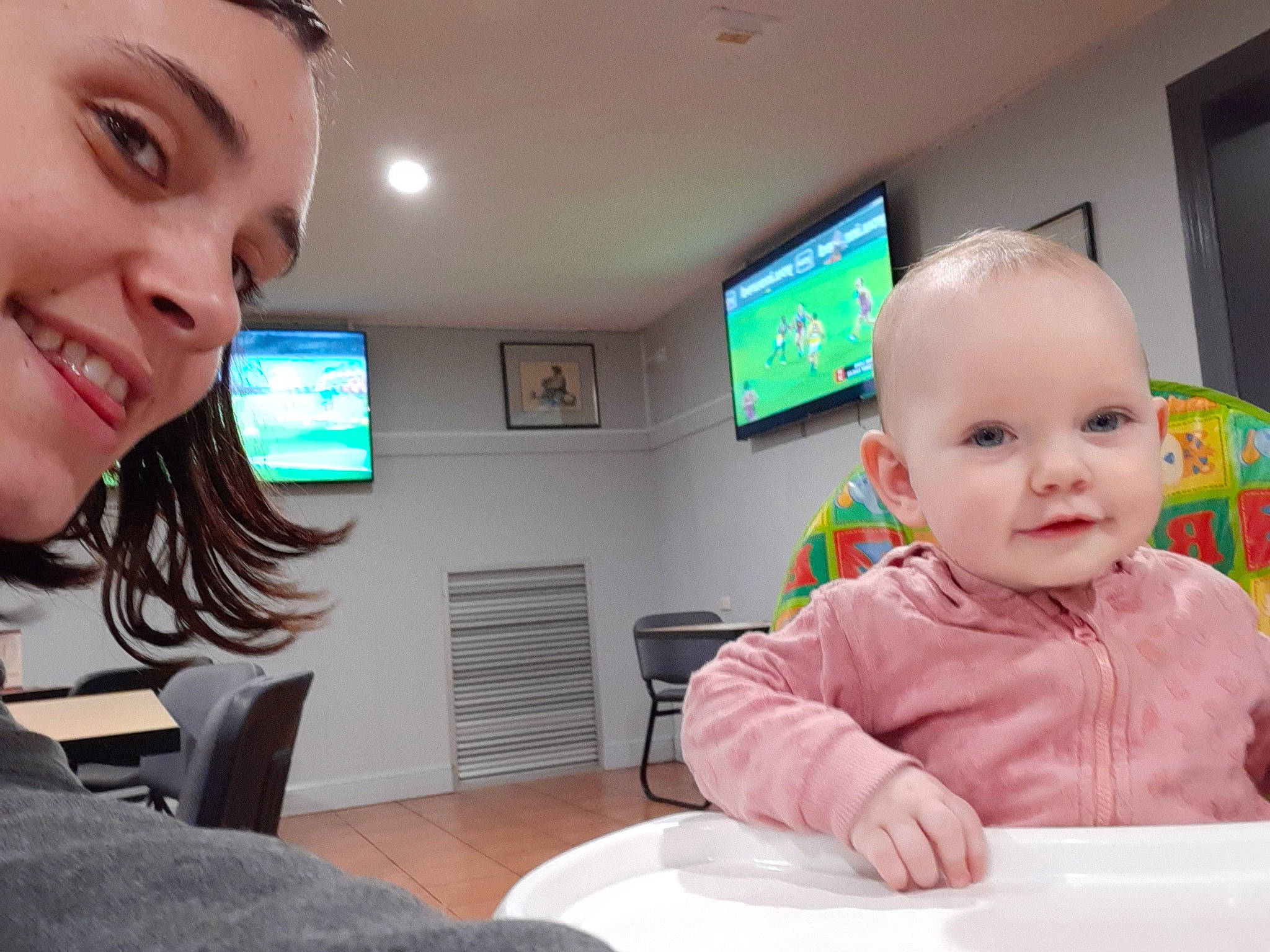 Amara is registered to the contest to win money with this photo: baby, cheek, child, ear, electronic_device, eye, face, joy, nose, person, skin, smile, technology, toddler