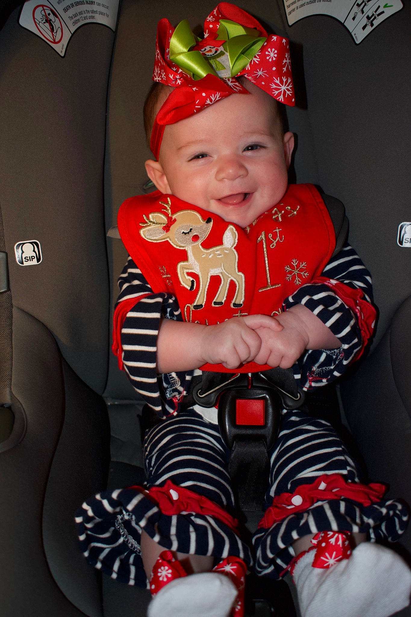 Paisley is registered to the contest to win money with this photo: baby, baby_toddler_clothing, carmine, child, costume_hat, event, face, facial_expression, fun, happy, hat, headwear, holiday, joy, knee, person, red, shorts, sleeve, smile