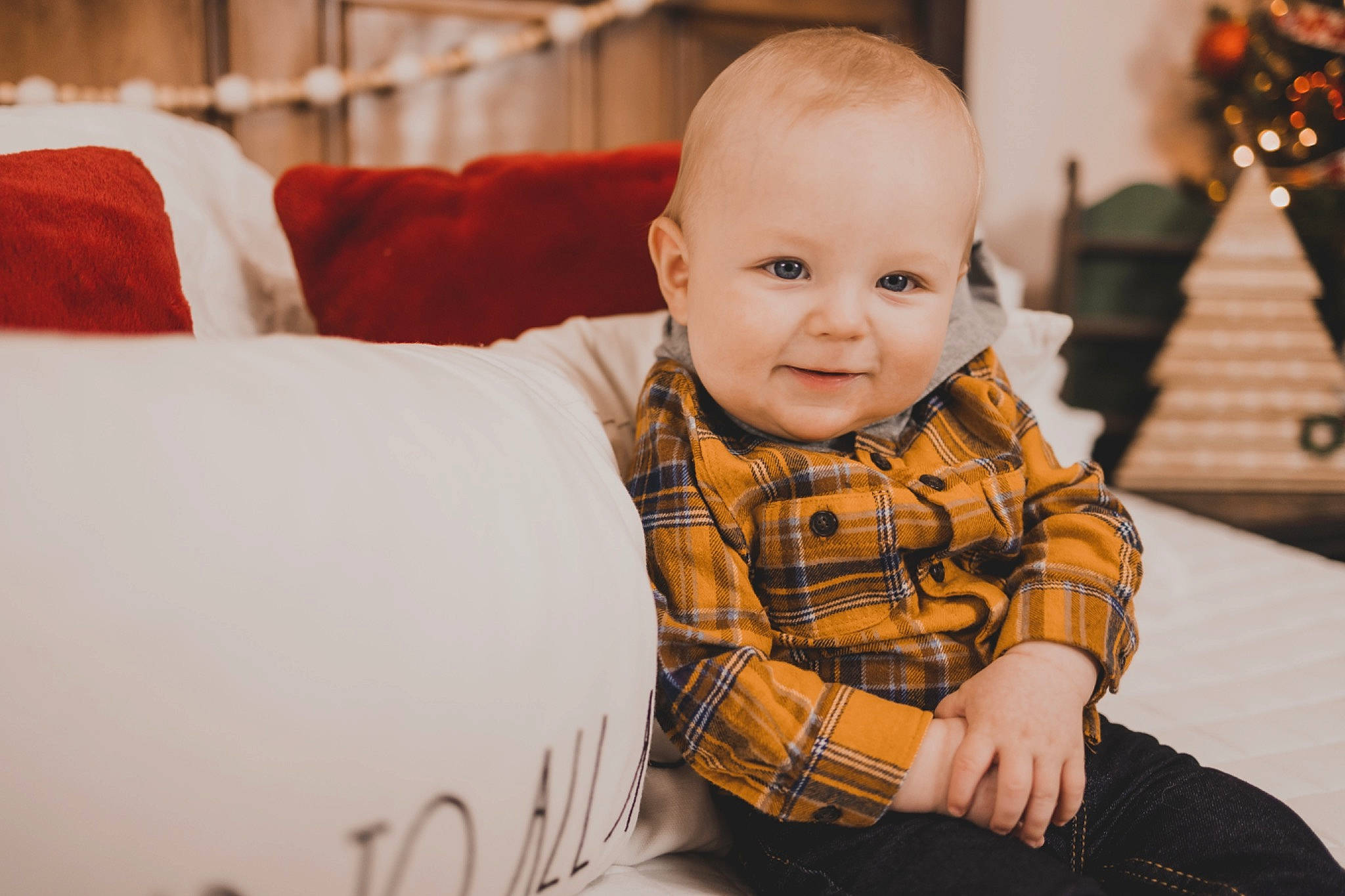 Echo joined the competition — help win amazing prizes! baby, baby_toddler_clothing, cheek, child, comfort, couch, eye, face, facial_expression, fun, happy, head, person, plaid, sitting, skin, sleeve, smile, standing, tartan
