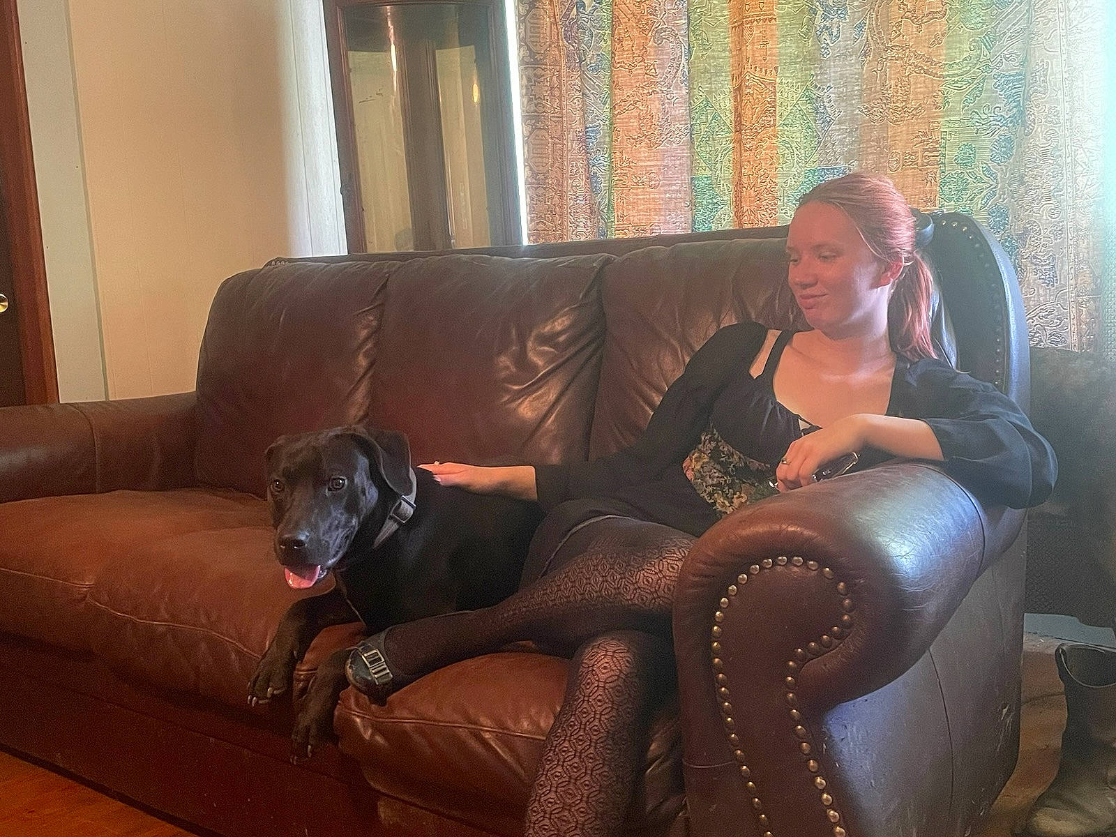 Lincoln is registered to the contest to win money with this photo: brown_hair, comfort, couch, floor, flooring, foot, hardwood, human_leg, interior_design, knee, latex, leg, living_room, long_hair, pantyhose, sitting, sofa_bed, stocking, studio_couch, thigh