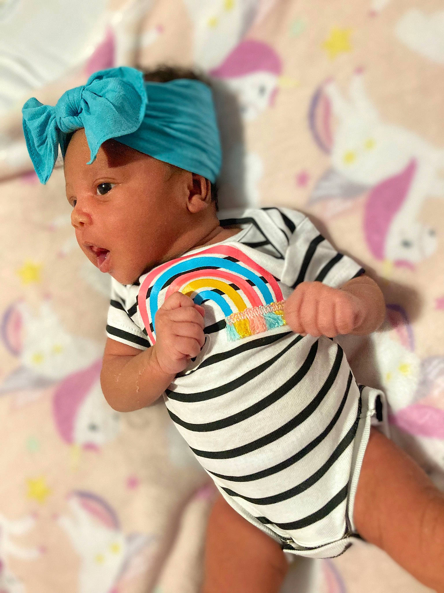 Loyalty is registered to the contest to win money with this photo: baby, baby_toddler_clothing, cap, child, electric_blue, face, fashion_accessory, fun, happy, headwear, human_leg, nail, pattern, person, pink, skin, sleeve, street_fashion, t_shirt, thigh