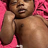 Jamarrion joined the competition — help win amazing prizes! baby, babylaying, bed, blanket, child, close_up, diaper, eyes, face, hair, indoors, infant, lying_down, newborn, photography, pink, portrait, relaxed, skin, sleepy