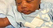 Jamarrion is registered to the contest to win money with this photo: awake, baby, blanket, blue_clothing, child, close_up, cozy, eyes, face, hair, hospital_blanket, indoors, infant, mouth, newborn, nose, onesie, portrait, sleepy, swaddled
