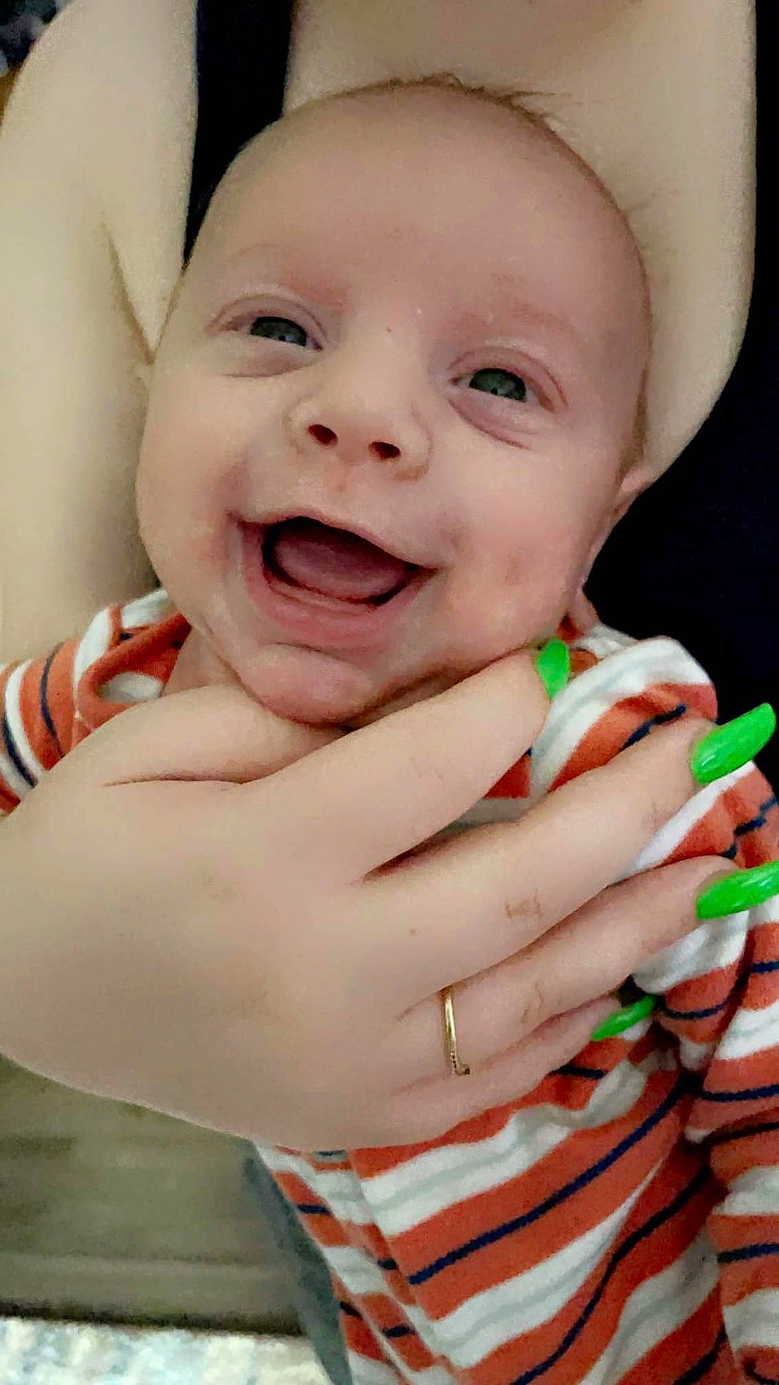 Alonzo joined the competition — help win amazing prizes! baby, baby_laughing, cheek, chin, eye, eyelash, facial_expression, finger, gesture, hand, happy, lip, mouth, nail, nose, person, skin, smile, thumb, toddler