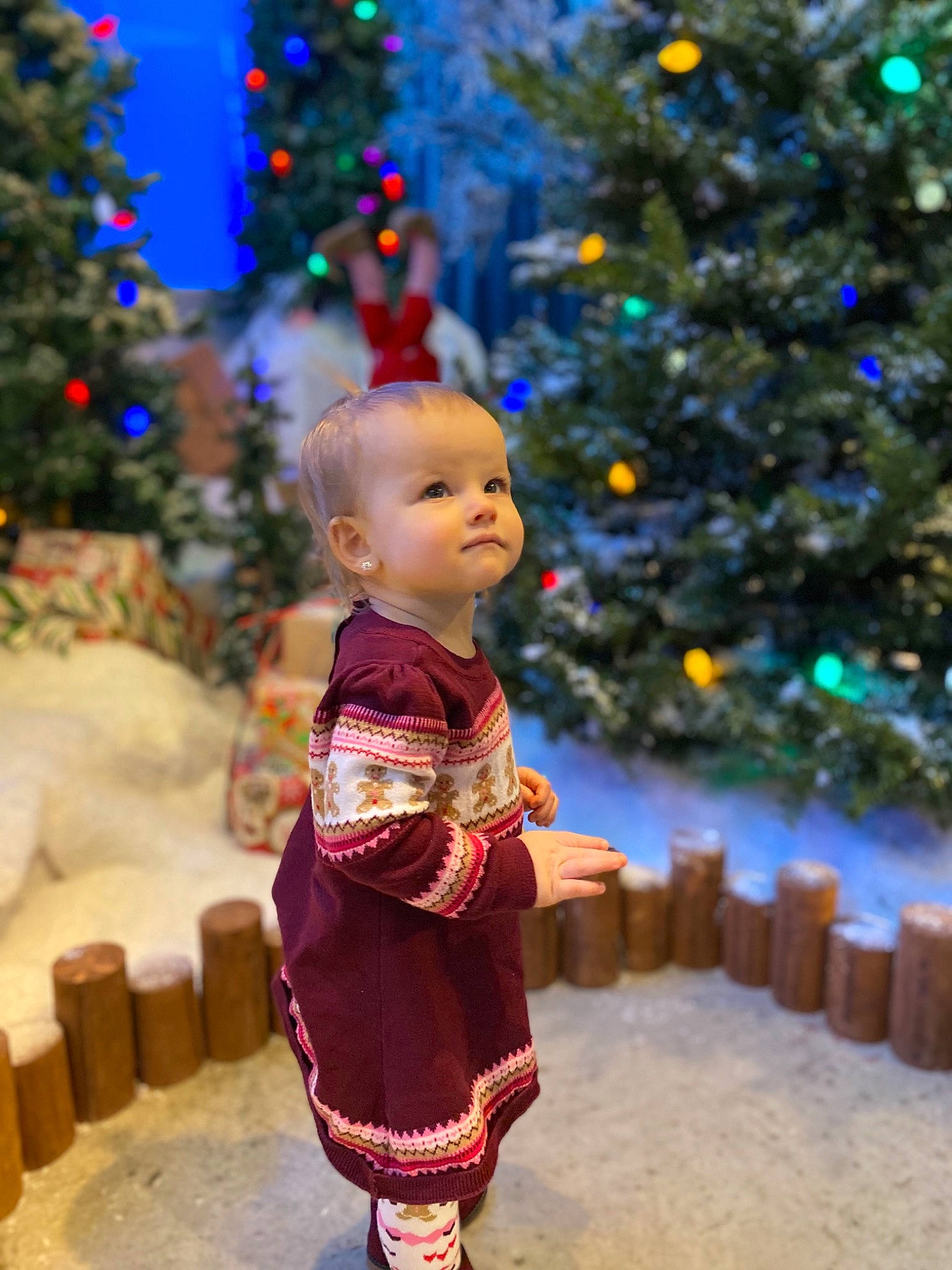 Haidyn joined the competition — help win amazing prizes! beauty, child, christmas_decoration, christmas_ornament, christmas_tree, facial_expression, fun, happy, head, human_body, nature, ornament, people, people_in_nature, person, plant, standing, toddler, toy, tree