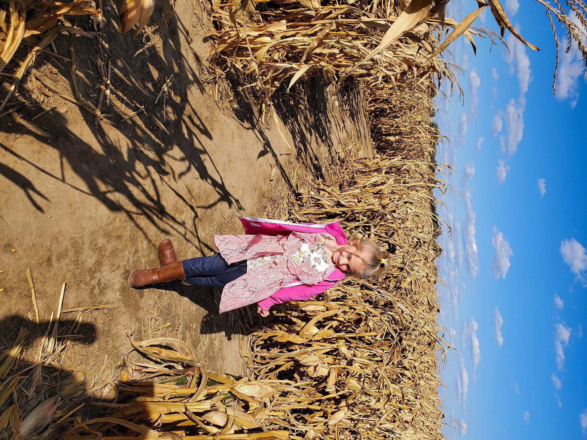 Adalynn is registered to the contest to win money with this photo: foot, hay, joy, people_in_nature, person, sand, straw