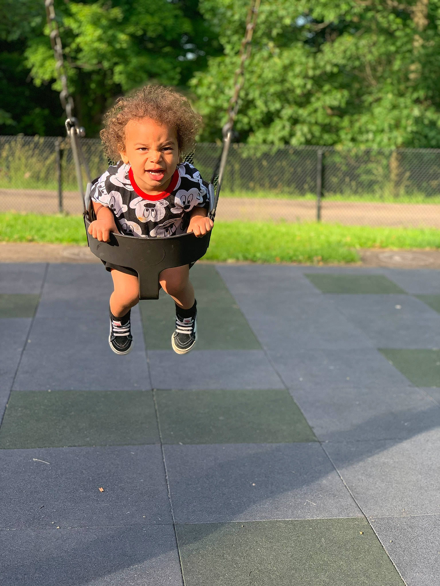 Kayden is registered to the contest to win money with this photo: anger, child, fun, outdoor_play_equipment, park, person, play, playground, public_space, recreation, rope, sorrow, summer, swing, toddler, tree, vacation
