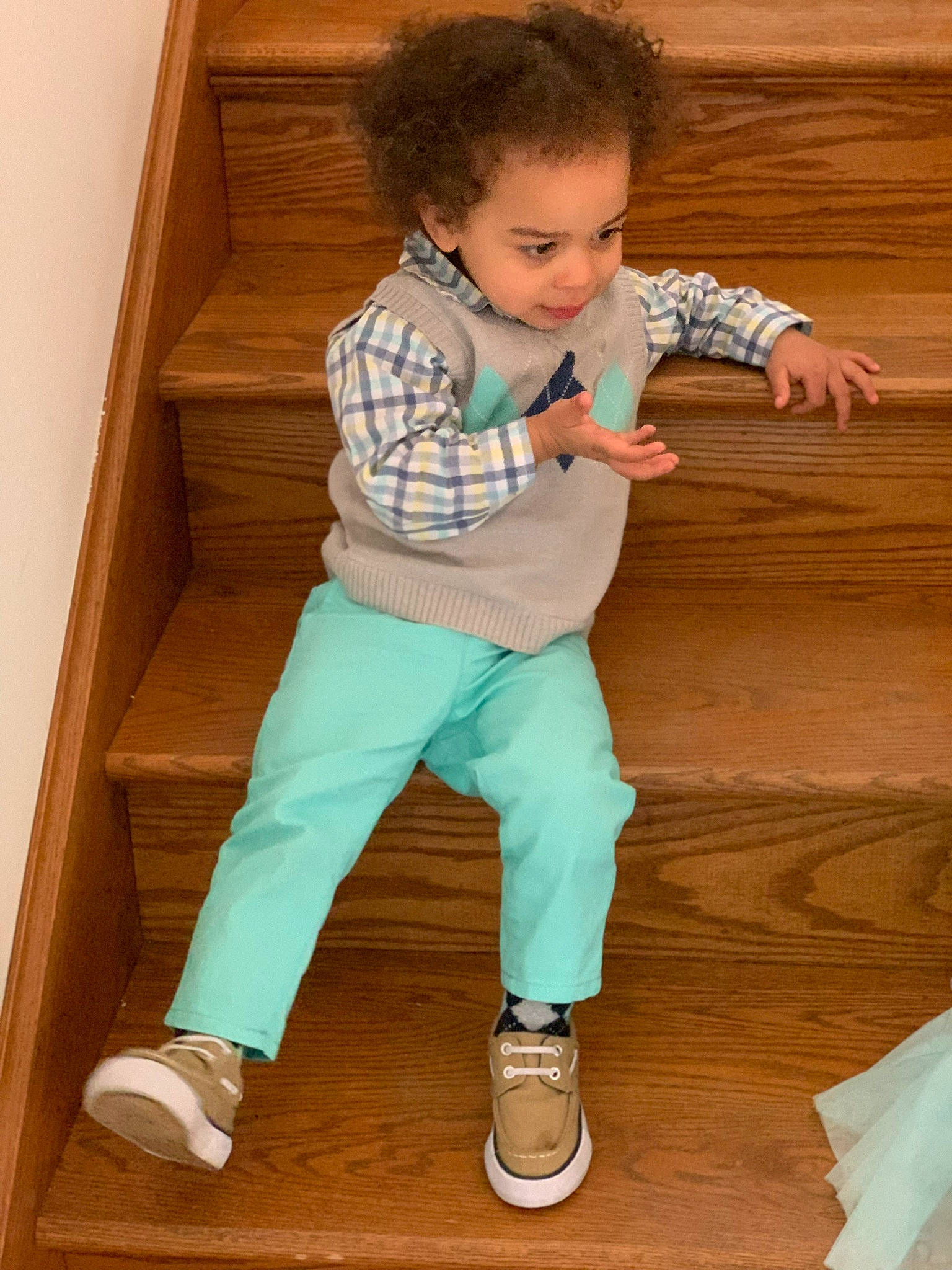 Kayden is registered to the contest to win money with this photo: child, jeans, leg, person, play, shoe, sleeve, standing, t_shirt, toddler, wood