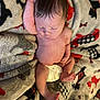 baby, newborn, infant, sleeping, diaper, blanket, pattern, soft, cute, peaceful, skin, arm, foot, hand, lying_down, indoors, rest, child, young, cozy