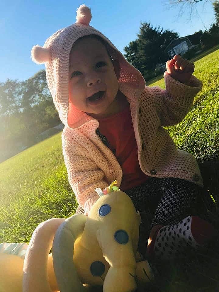 Rhea joined the competition — help win amazing prizes! baby, baby_products, baby_toddler_clothing, baby_toys, bonnet, headwear, knitting, meadow, mouth, people_in_nature, person, prairie, stuffed_toy, sun_hat, sunlight, toddler, toy, wool, woolen