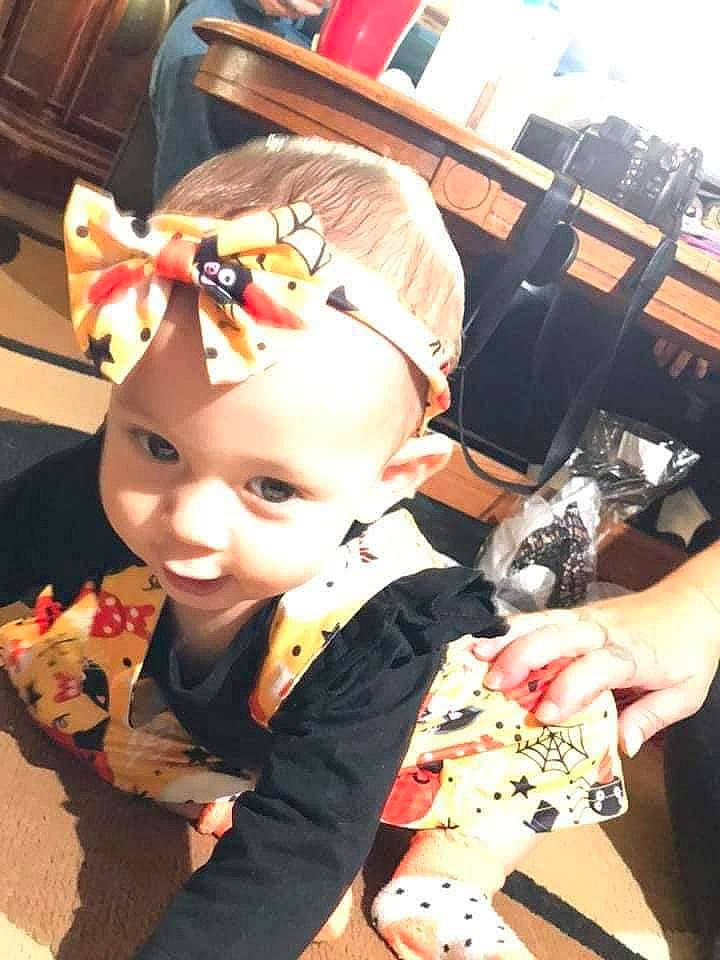 Rhea joined the competition — help win amazing prizes! baby, baby_toddler_clothing, costume_accessory, hair_accessory, headband, headwear, human, overall, person, plush, stuffed_toy, toy, toy_dog