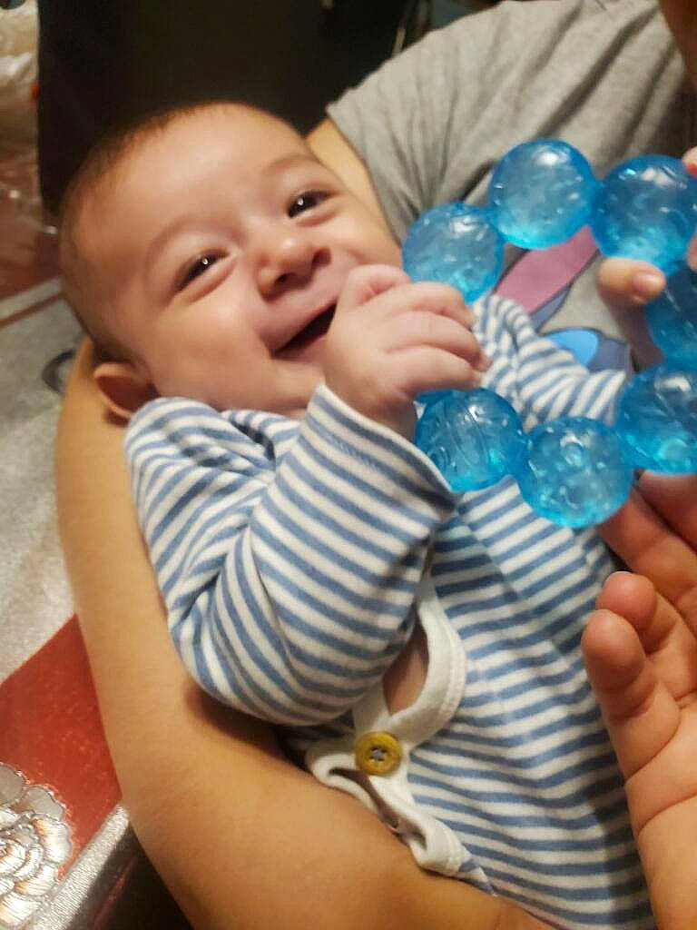 Izan joined the competition — help win amazing prizes! baby, baby_bottle, baby_toddler_clothing, cheek, child, comfort, drinkware, finger, fun, gesture, hand, happy, mouth, nail, person, plastic_bottle, skin, smile, thumb, toddler