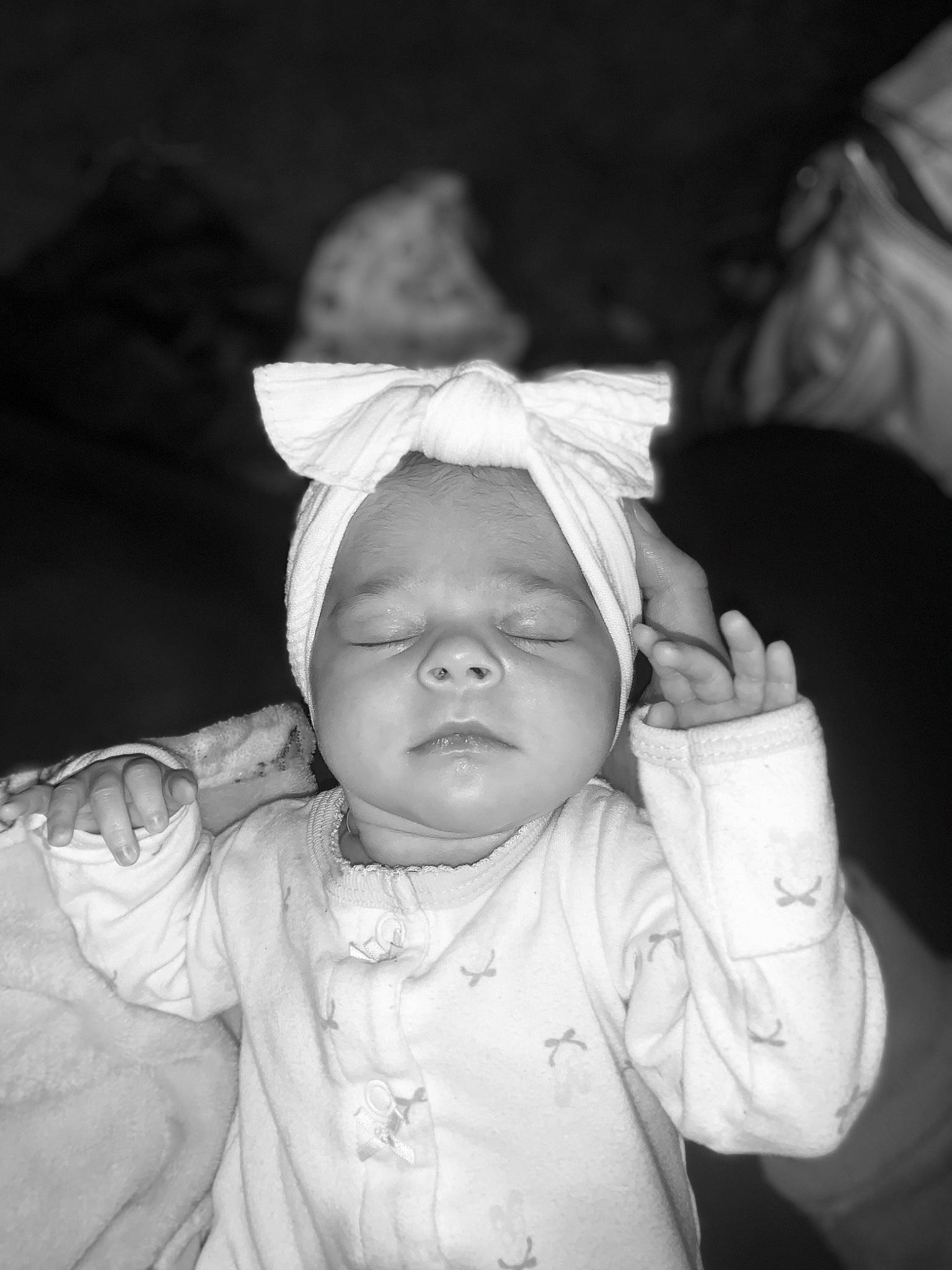 Penelope Rose is registered to the contest to win money with this photo: arm, baby, baby_sleeping, baby_toddler_clothing, cheek, child, comfort, eyebrow, flash_photography, fun, gesture, hand, happy, monochrome, monochrome_photography, person, portrait_photography, sleeve, smile, thumb
