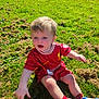 Alfie joined the competition — help win amazing prizes! toddler, child, grass, outdoor, red_shirt, sportswear, shoes, socks, mud, sunlight, greenery, young_child, casual, nature, playing, sitting, daylight, portrait, curious, field