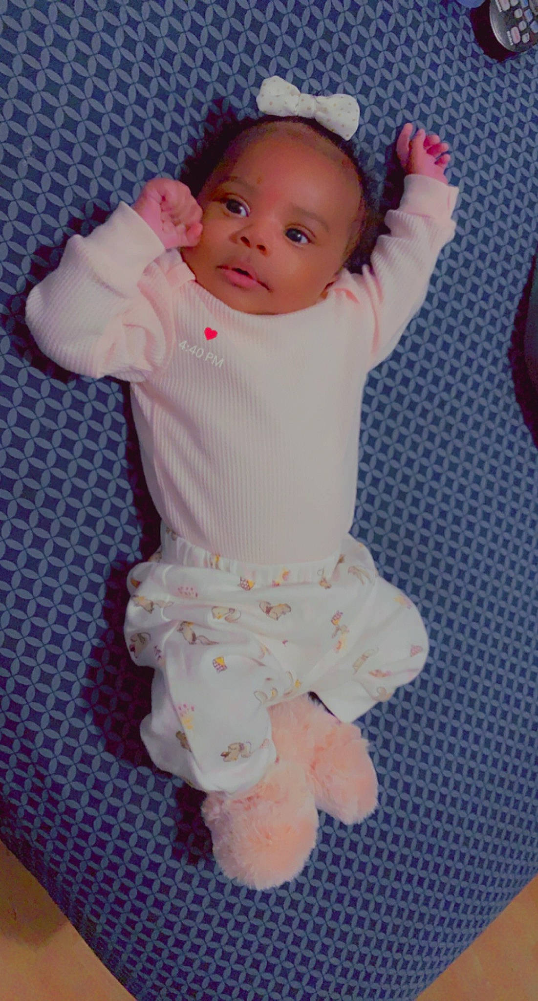 Jada is registered to the contest to win money with this photo: baby, baby_products, baby_toddler_clothing, cheek, child, headband, headpiece, kitchen_utensil, nightwear, pajamas, pattern, peach, person, pink, toddler, wine_glass