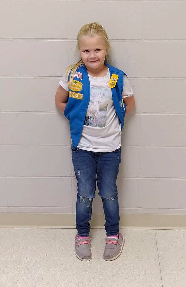 Mia Harnish is registered to the contest to win money with this photo: arm, baby_toddler_clothing, denim, electric_blue, face, footwear, hair, happy, jeans, joy, knee, leg, neck, person, sleeve, smile, sneakers, sportswear, standing, street_fashion