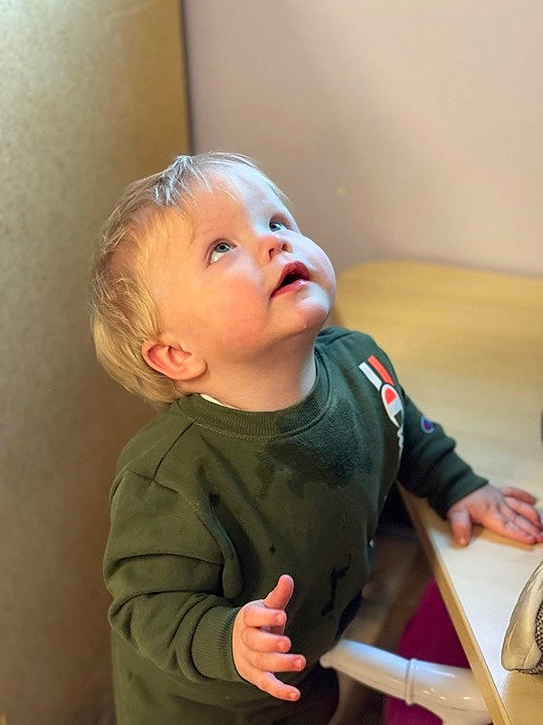 Asher Lenz joined the competition — help win amazing prizes! baby, baby_toddler_clothing, cheek, child, fun, gesture, happy, laugh, nose, person, room, sitting, skin, sleeve, smile, standing, t_shirt, thumb, toddler, wood