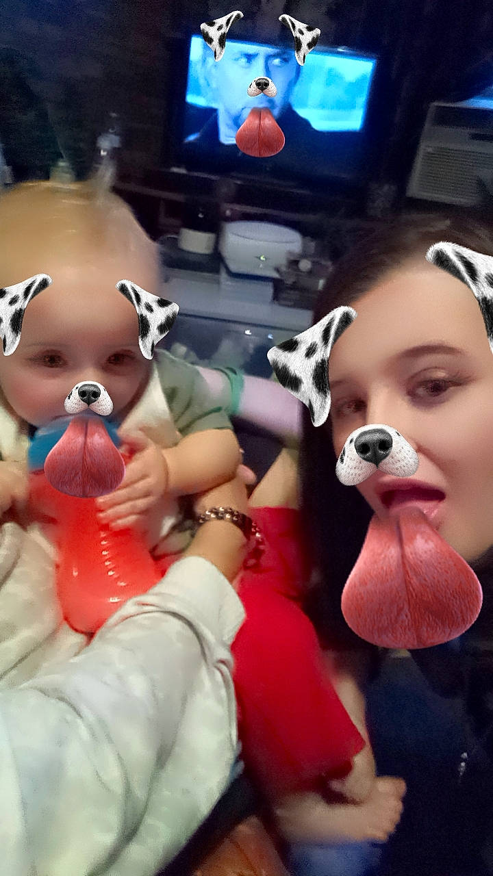 Cole is registered to the contest to win money with this photo: animated_cartoon, animation, audio_equipment, carmine, doll, event, finger, fun, fur, gesture, happy, led_backlit_lcd_display, mammal, mouth, nail, person, plush, snapshot, stuffed_toy, television