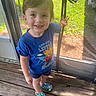 Rhyker joined the competition — help win amazing prizes! child, toddler, smiling, blue_tshirt, shorts, colorful_shoes, screen_door, wooden_porch, outdoor, daylight, happy, person, young_child, standing, greenery, sunlight, casual_clothing, portrait, cute, playful